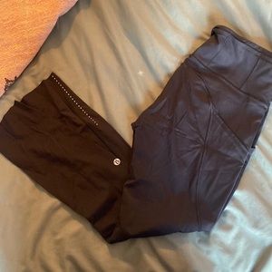 Lululemon black running leggings w/ side pockets size 8